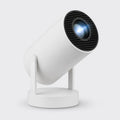 The white Hollowpane projector on a studio background, its lens throwing a soft blue beam